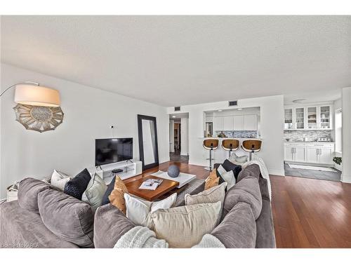 207-185 Ontario Street, Kingston, ON - Indoor Photo Showing Living Room
