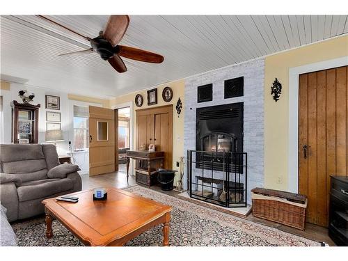 7387 County Rd 9, Napanee, ON - Indoor Photo Showing Living Room With Fireplace