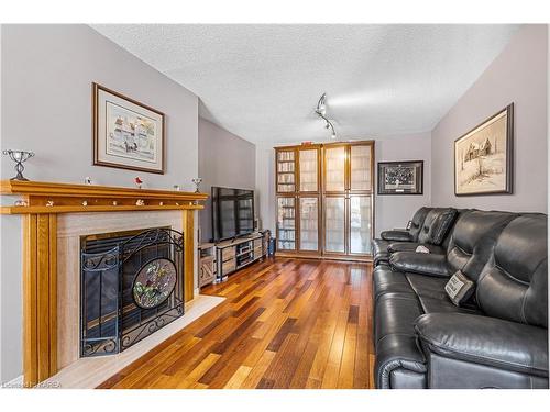 12 Buckingham Court, Kingston, ON - Indoor Photo Showing Living Room With Fireplace