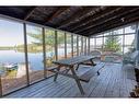 100 Sister Island, Arden, ON  - Outdoor With Body Of Water With Deck Patio Veranda 