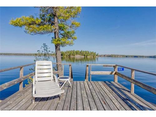 100 Sister Island, Arden, ON - Outdoor With Body Of Water With Deck Patio Veranda With View