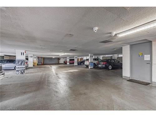 703-675 Davis Drive, Kingston, ON - Indoor Photo Showing Garage