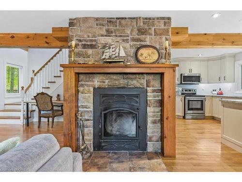 6397 Salmon Lake Road, Sydenham, ON - Indoor Photo Showing Living Room With Fireplace