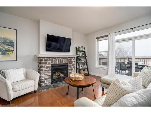 136 Morgan Drive, Sydenham, ON - Indoor Photo Showing Living Room With Fireplace