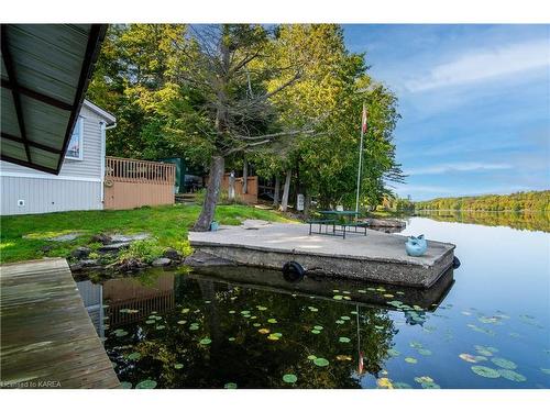 1124 Otter Point Lane, Sydenham, ON - Outdoor With Body Of Water