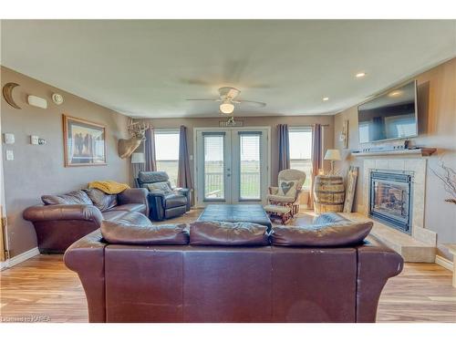 806 Reeds Bay Road, Wolfe Island, ON - Indoor Photo Showing Living Room With Fireplace