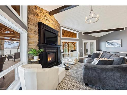 35 Chisamore Point, Gananoque, ON - Indoor Photo Showing Living Room With Fireplace