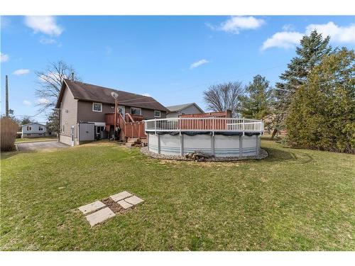 315 Amherst Drive, Amherstview, ON - Outdoor With Above Ground Pool