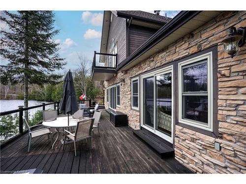2000 Brewer Road, Sharbot Lake, ON - Outdoor With Body Of Water With Deck Patio Veranda With View