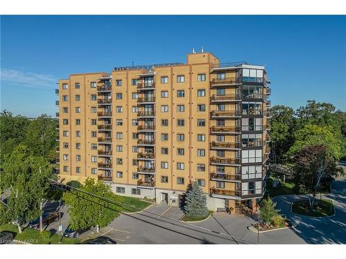 704-120 Barrett Court, Kingston, ON - Outdoor With Balcony With Facade