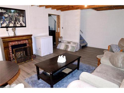 94-131 Rosemund Crescent, Kingston, ON - Indoor Photo Showing Living Room With Fireplace