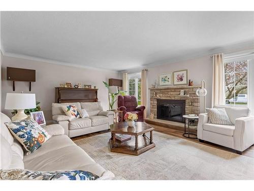 130 Kinogama Avenue, Kingston, ON - Indoor Photo Showing Living Room With Fireplace