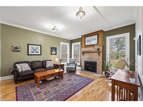 4607 Lower Round Lake Road, Frontenac, ON - Indoor Photo Showing Living Room With Fireplace