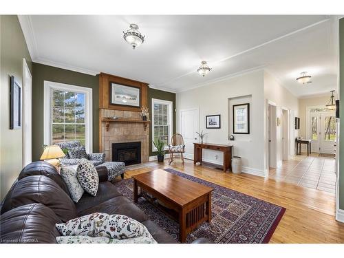 4607 Lower Round Lake Road, Frontenac, ON - Indoor Photo Showing Living Room With Fireplace