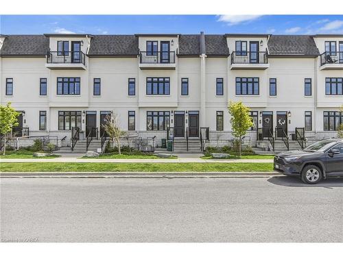 203-1005 Terra Verde Way, Kingston, ON - Outdoor With Balcony With Facade