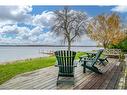 70 Dugan'S Lane, Wolfe Island, ON  - Outdoor With Body Of Water With Deck Patio Veranda With View 
