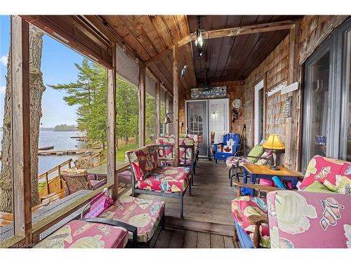 1128 Sparks Lane, South Frontenac, ON - Outdoor With Body Of Water With Deck Patio Veranda