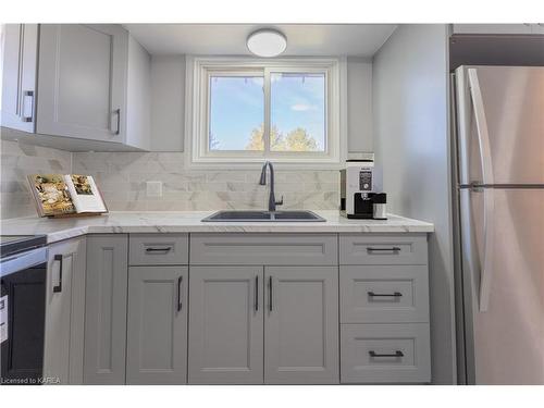 1-389 Melanie Avenue, Kingston, ON - Indoor Photo Showing Kitchen With Double Sink