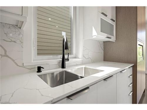20 Park Crescent, Amherstview, ON - Indoor Photo Showing Kitchen With Double Sink