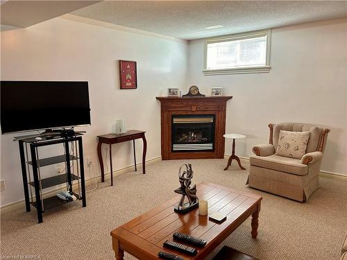 256 Smuggler'S Cove Drive, Kingston, ON - Indoor With Fireplace
