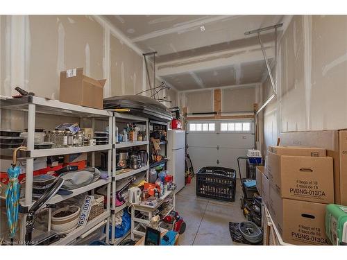 150 Dr Richard James Crescent, Amherstview, ON - Indoor Photo Showing Garage