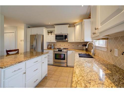 201 Colebrook Road, Yarker, ON - Indoor Photo Showing Kitchen With Double Sink