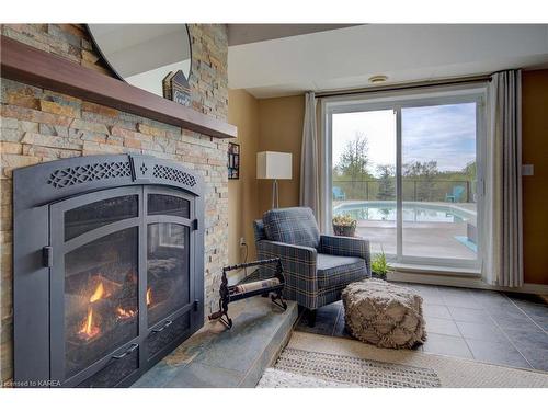 201 Colebrook Road, Yarker, ON - Indoor Photo Showing Living Room With Fireplace
