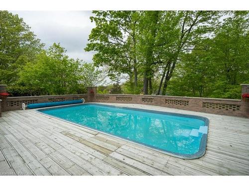 23 Brooklands Park Avenue, Bath, ON - Outdoor With In Ground Pool With Deck Patio Veranda With Backyard