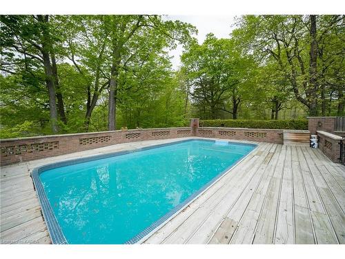 23 Brooklands Park Avenue, Bath, ON - Outdoor With In Ground Pool With Deck Patio Veranda With Backyard