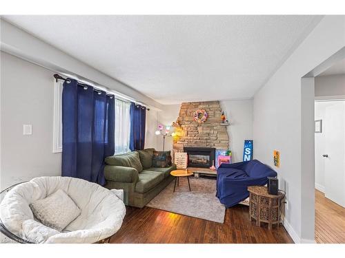58 Cliff Crescent, Kingston, ON - Indoor Photo Showing Living Room With Fireplace