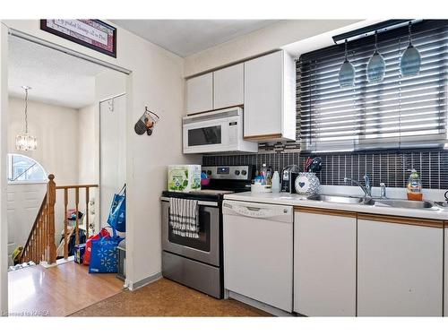 313 Owens Crescent, Kingston, ON - Indoor Photo Showing Kitchen With Double Sink