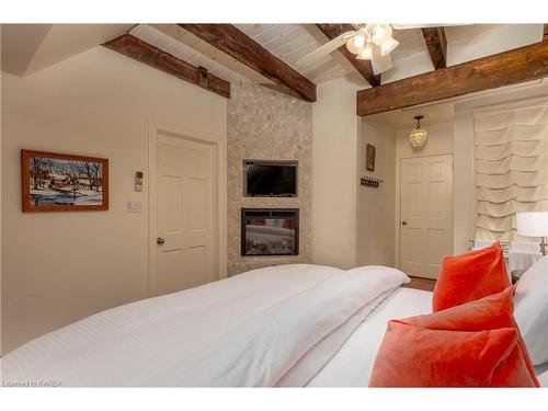 8 Starr Place, Kingston, ON - Indoor Photo Showing Bedroom With Fireplace