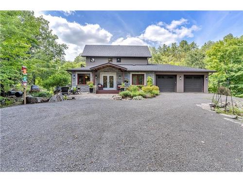 7955 Perth Road, South Frontenac, ON - Outdoor With Facade