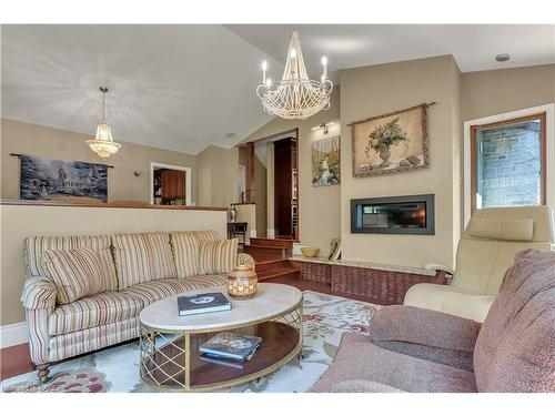 7955 Perth Road, South Frontenac, ON - Indoor Photo Showing Living Room With Fireplace