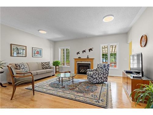 41 Bayshore Drive, Bath, ON - Indoor Photo Showing Living Room With Fireplace