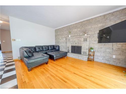 25 Livingston Avenue, Kingston, ON - Indoor Photo Showing Living Room With Fireplace