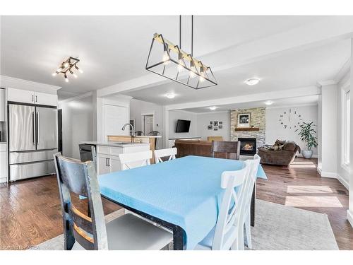 1131 Wintergreen Crescent, Kingston, ON - Indoor Photo Showing Dining Room With Fireplace