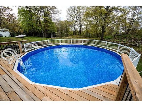 13 Bradshaw Road, Tichborne, ON - Outdoor With Above Ground Pool With Deck Patio Veranda With Backyard