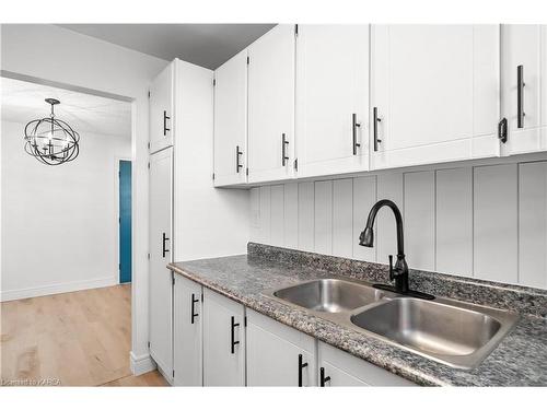 106-835 Milford Drive, Kingston, ON - Indoor Photo Showing Kitchen With Double Sink