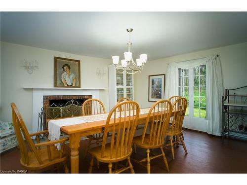 14005 Front Road, Stella, ON - Indoor Photo Showing Dining Room With Fireplace