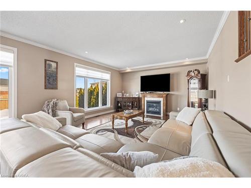 1128 Escala Crescent, Kingston, ON - Indoor Photo Showing Living Room With Fireplace