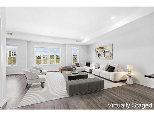 203-1005 Terra Verde Way, Kingston, ON - Indoor Photo Showing Living Room