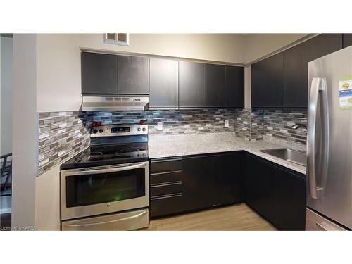 203-745 Davis Drive, Kingston, ON - Indoor Photo Showing Kitchen With Stainless Steel Kitchen With Upgraded Kitchen