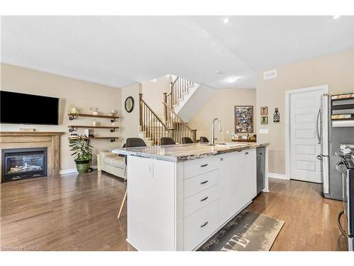 1104 Escala Crescent, Kingston, ON - Indoor Photo Showing Kitchen With Fireplace