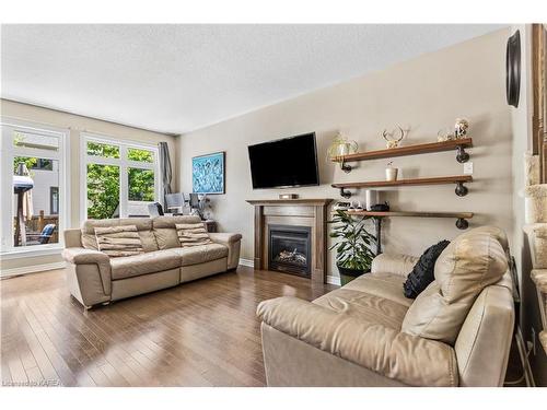 1104 Escala Crescent, Kingston, ON - Indoor Photo Showing Living Room With Fireplace
