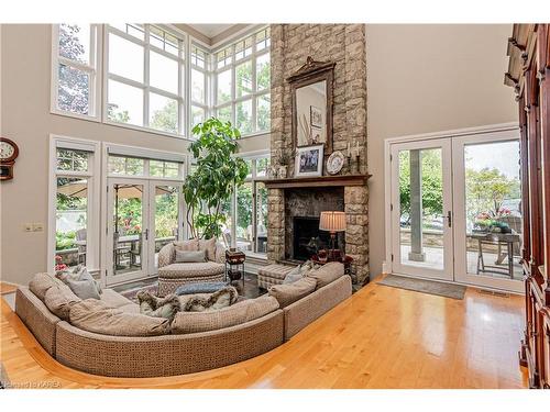 96 & 88 Spithead Road, Howe Island, ON - Indoor Photo Showing Living Room With Fireplace