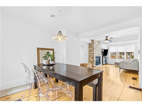 11 Raglan Road, Kingston, ON - Indoor Photo Showing Dining Room With Fireplace