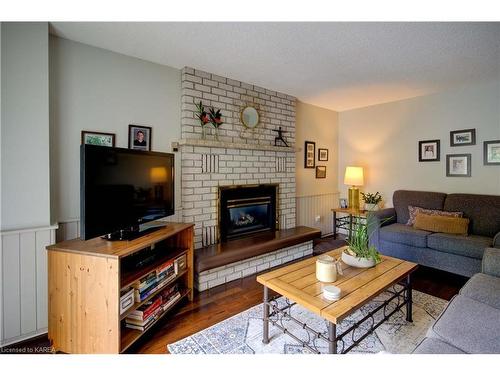 1058 Pembridge Crescent, Kingston, ON - Indoor Photo Showing Living Room With Fireplace