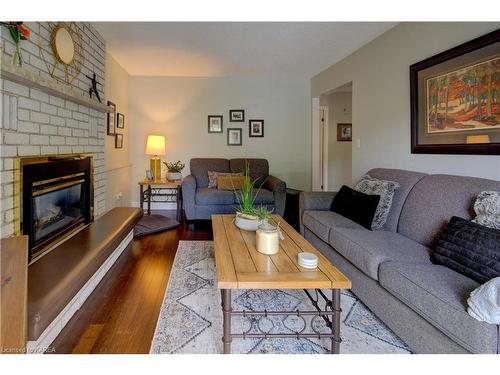 1058 Pembridge Crescent, Kingston, ON - Indoor Photo Showing Living Room With Fireplace