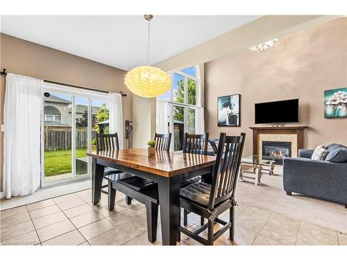 397 Cavendish Crescent, Kingston, ON - Indoor Photo Showing Dining Room With Fireplace